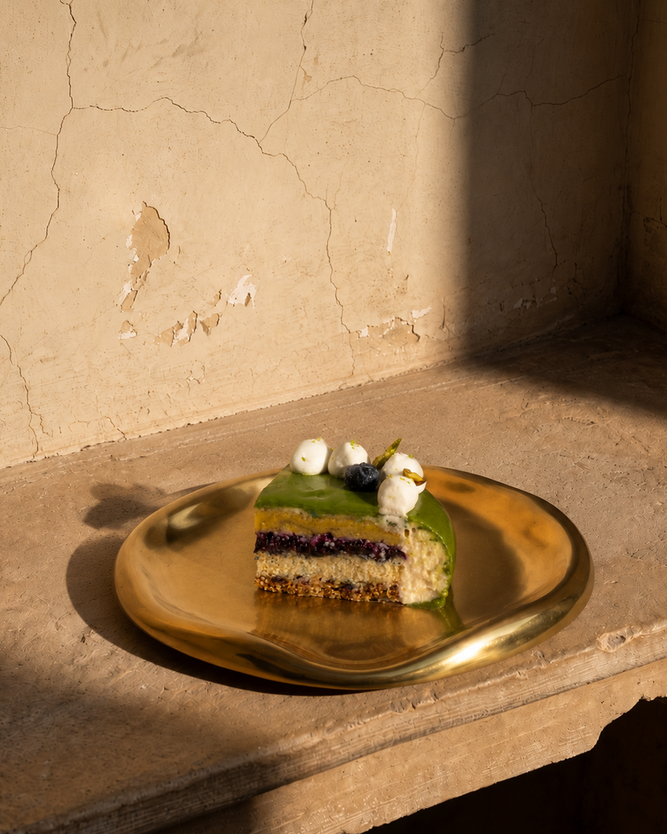 Kaffir Lime, Pista & Blueberry cake slice